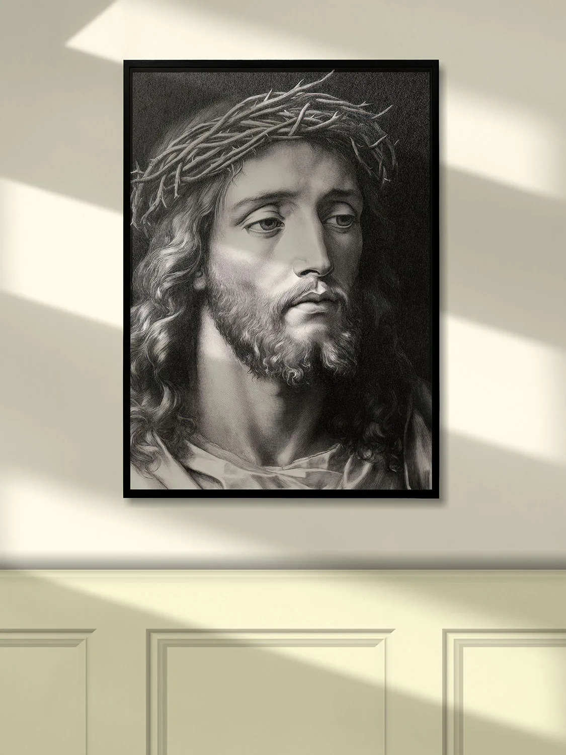 Charcoal Jesus portrait with crown of thorns canvas, detailed beard, and dramatic lighting against a dark background (hung on the wall)