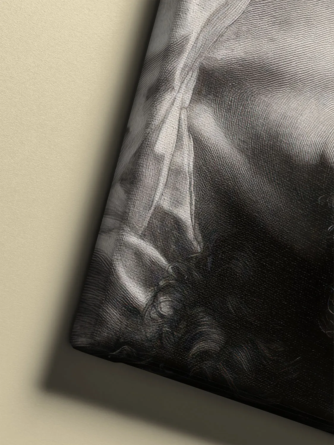 Charcoal Jesus portrait with crown of thorns canvas, detailed beard, and dramatic lighting against a dark background (canvas details)