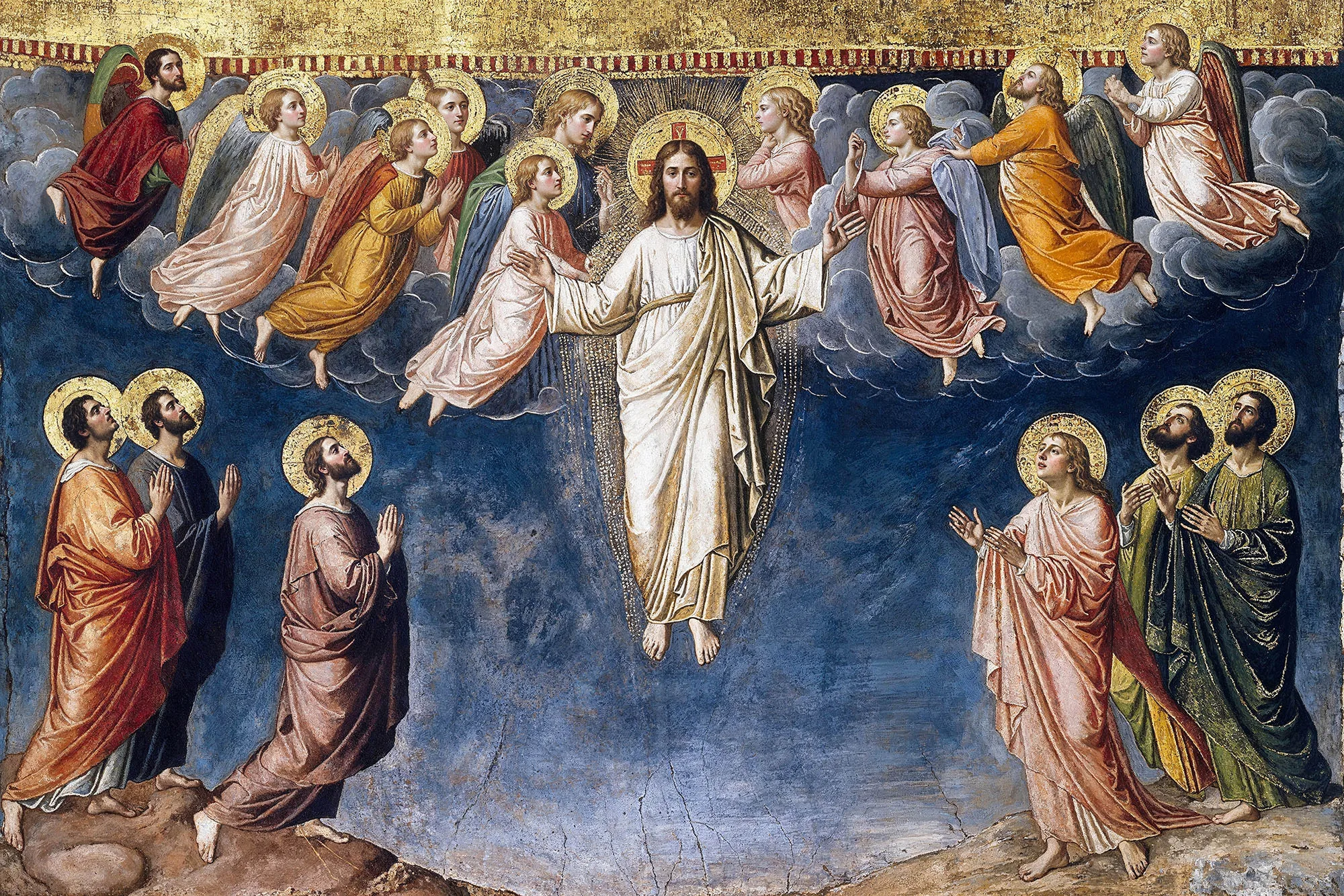 Byzantine Transfiguration icon: Christ radiant in gold mandorla, flanked by angels, with kneeling disciples below against a flat gold and blue background.