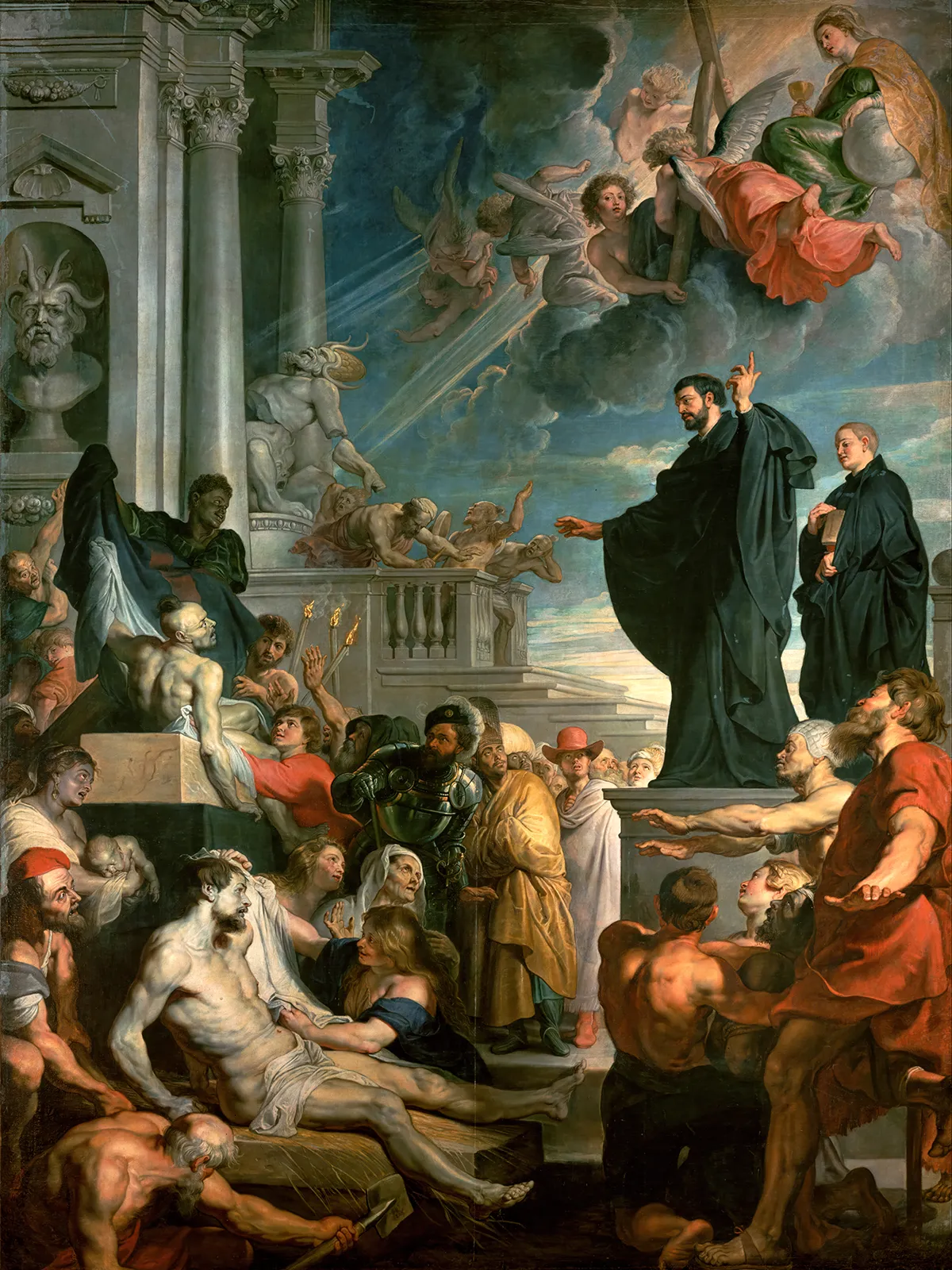 Francis Xavier preaching from a platform while the sick are healed and a pagan idol falls