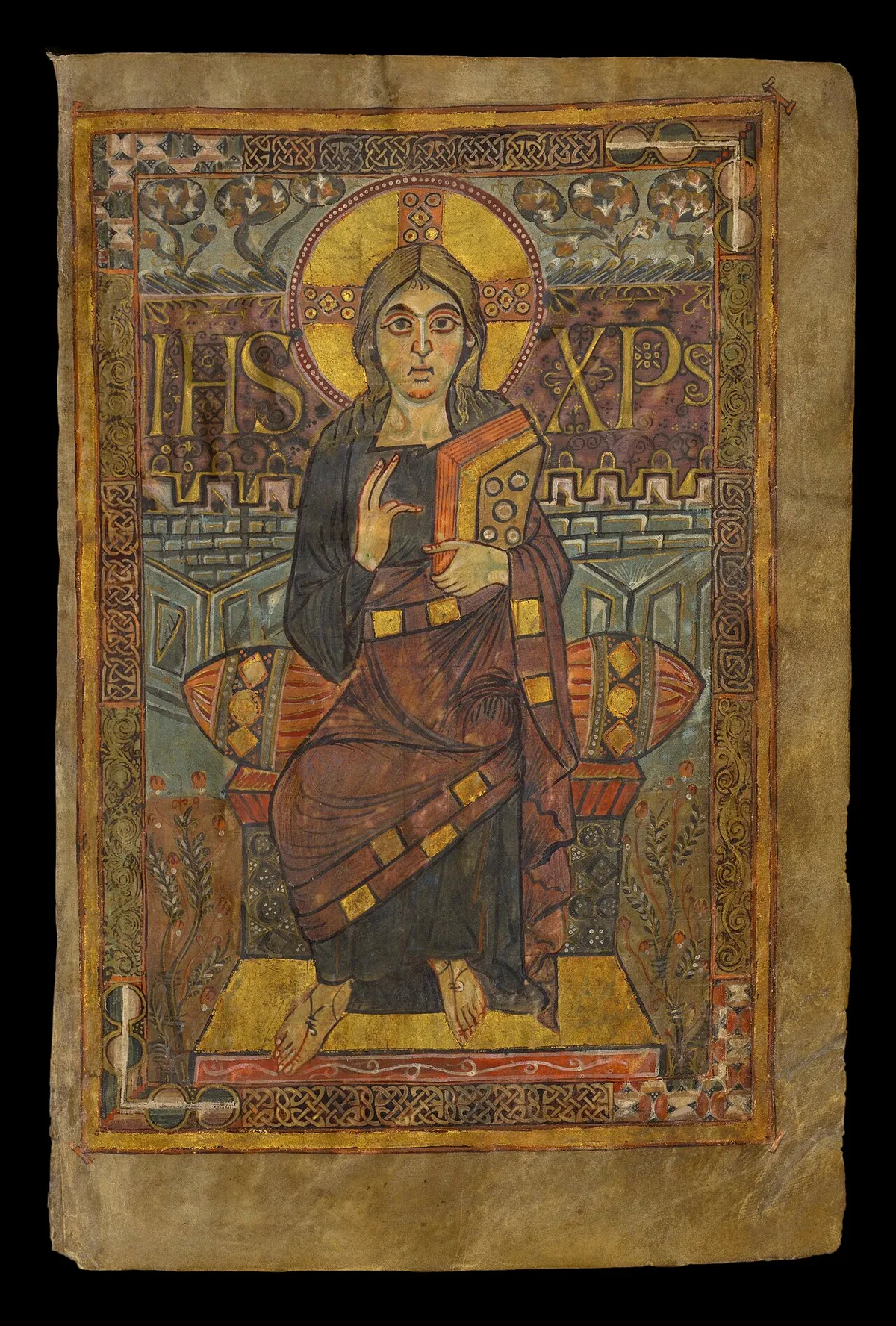 Christ in Majesty from the Godescalc Evangelistary, seated and blessing, painted in gold and silver on purple vellum