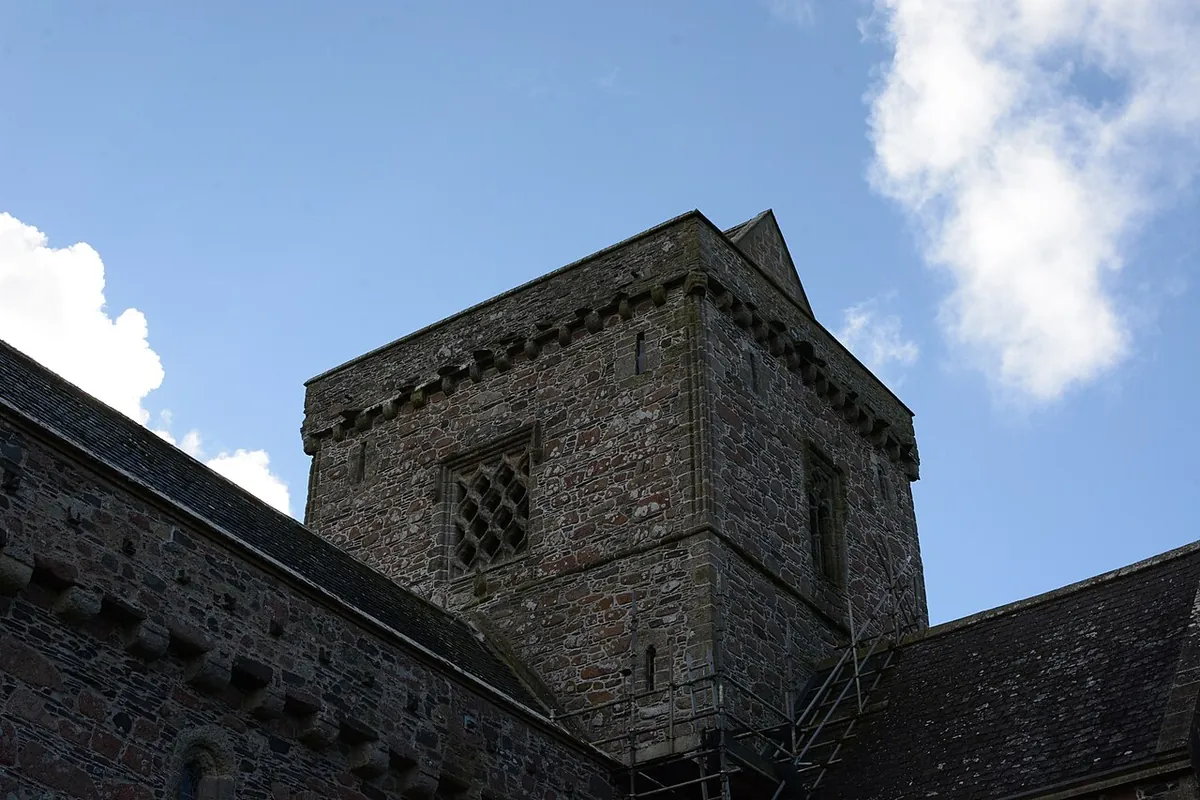 Iona Abbey in Scotland, the medieval stone church and tower rebuilt on the site of Columba's monastery
