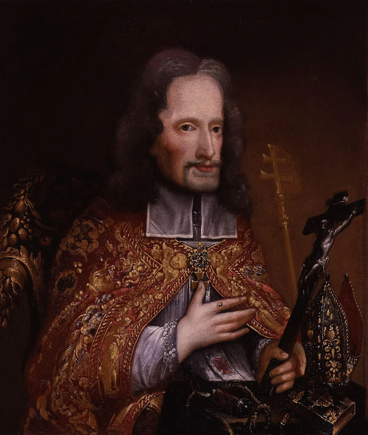 Oil portrait of Oliver Plunkett in a red and gold cope, holding a crucifix and a cross staff, with a mitre beside him