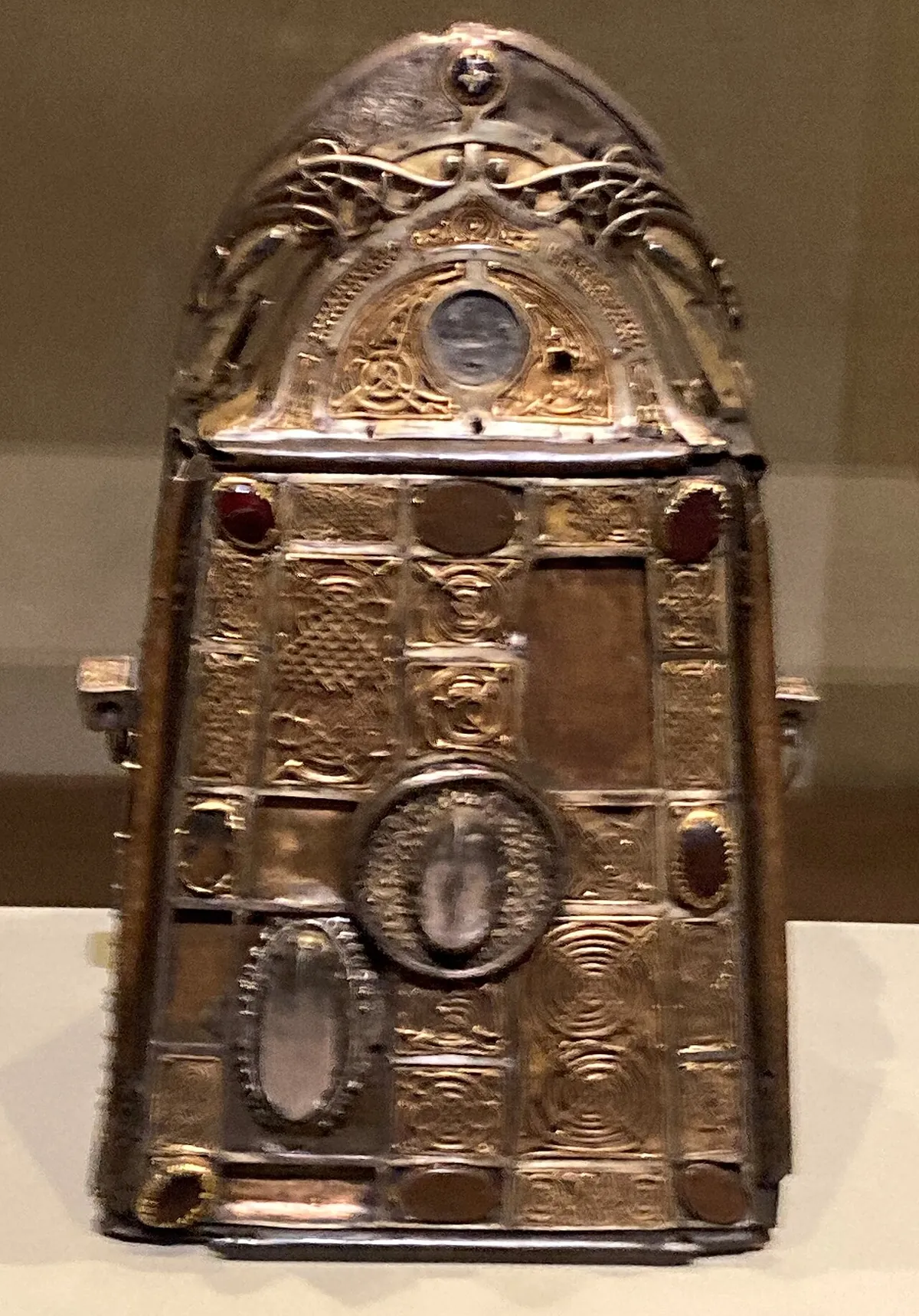 The bronze and gold shrine made to hold Saint Patrick's iron bell, its front covered in gold filigree interlace and set with stones